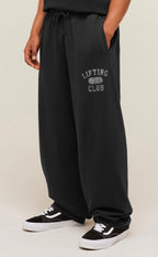 GYMSHARK RETRO COLLEGIATE GRAPHIC WIDE LEG PANTS (BLACK)