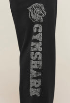 GYMSHARK RETRO COLLEGIATE GRAPHIC WIDE LEG PANTS (BLACK)